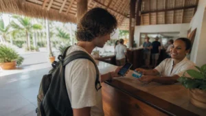 Traveller using a smartphone in the Dominican Republic for best sim card dominican republic