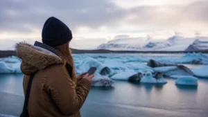 Traveller using a smartphone in Iceland