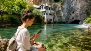 Traveller using a smartphone during bosnia and herzegovina summer travel in Bosnia and Herzegovina.
