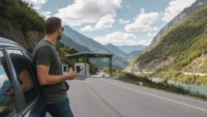 Traveller using a smartphone during bosnia to serbia mobile internet and intercity bus connectivity guide in Serbia.