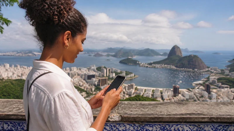 Traveller using a smartphone in Brazil for brazil esim iphone
