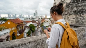 Traveller using a smartphone in Colombia for reliable internet for business travel in colombia