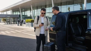 Traveller using a smartphone during cyprus airport transfer mobile internet guide