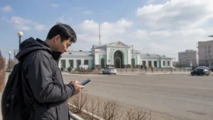Traveller using a smartphone in Mongolia for darkhan mobile internet
