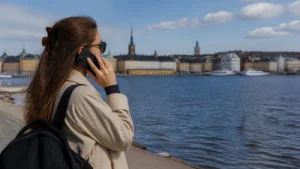 Traveller using a smartphone while preparing for does whatsapp work in sweden