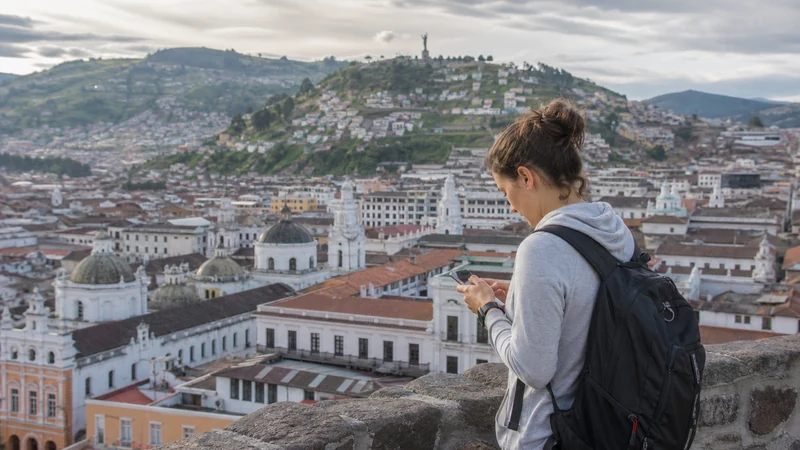 Traveller using a smartphone in Ecuador for ecuador digital nomad internet