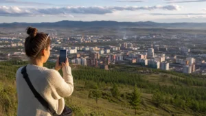 Traveller using a smartphone in Mongolia for erdenet mobile internet