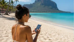 Traveller using a smartphone in Mauritius while researching mobile internet in flic-en-flac
