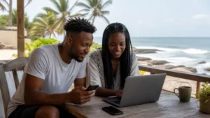 Travel companions using a phone hotspot on the Ghana coast