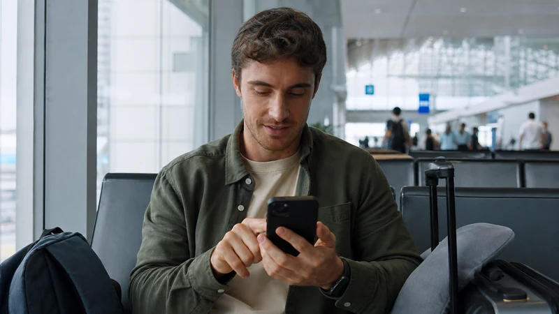 Traveller configuring an eSIM at Gimpo Airport