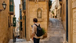 Traveller using a smartphone in Malta while using Google Maps in Malta