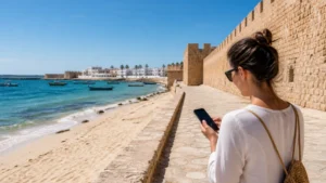 Traveller using a smartphone for Hammamet Mobile Internet in Tunisia