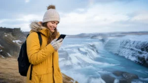 Traveller using a smartphone in Iceland