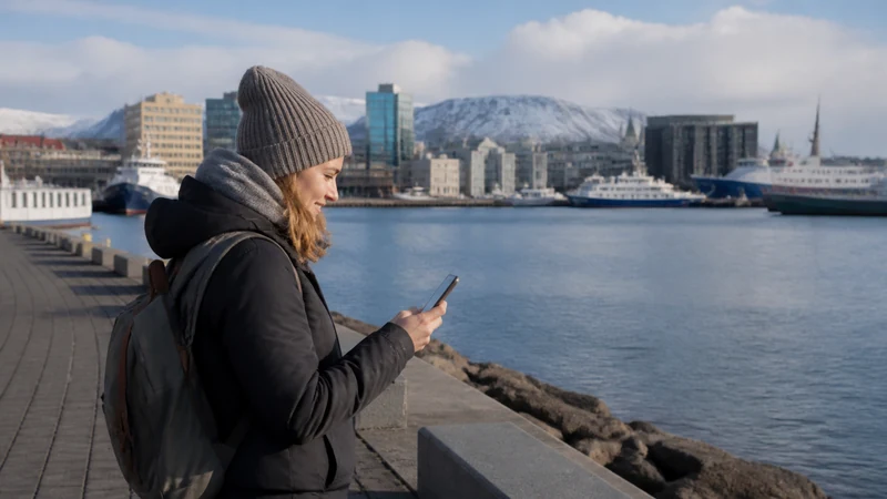 Traveller using a smartphone in Iceland
