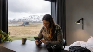 Traveller using a smartphone in Iceland