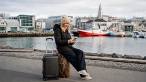 Traveller using a smartphone in Iceland