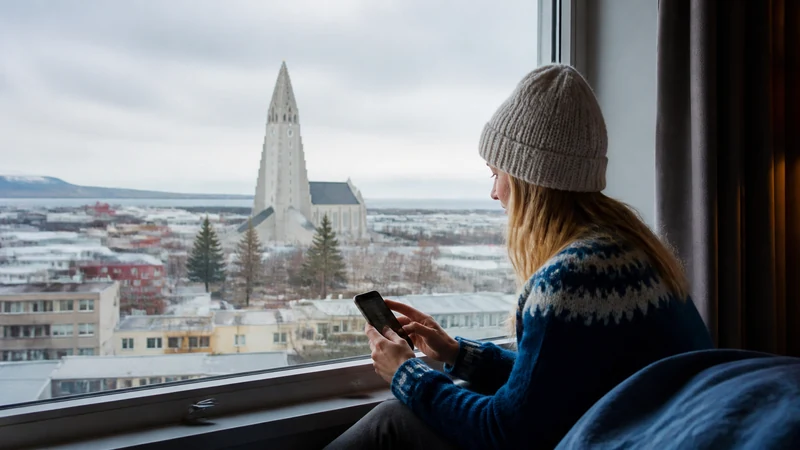 Traveller using a smartphone in Iceland