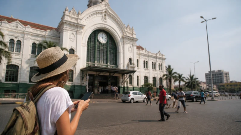 Traveller checking a smartphone while exploring Maputo, Mozambique