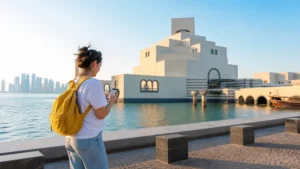 Traveller using a smartphone in tourist navigating beside the Museum of Islamic Art waterfront
