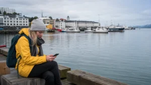 Traveller using a smartphone in Reykjavík