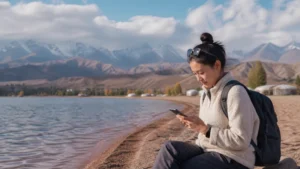 Traveller using a smartphone in Kyrgyzstan for issyk kul mobile internet