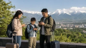 Family travellers coordinating their journey from an Almaty viewpoint.