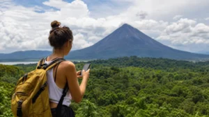 Traveller using a smartphone in Costa Rica for what to expect from mobile data in la fortuna