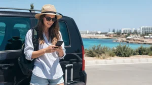 Traveller using a smartphone during larnaca to ayia napa mobile internet guide