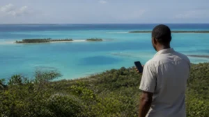Traveller checking mobile coverage on a smartphone in Mozambique