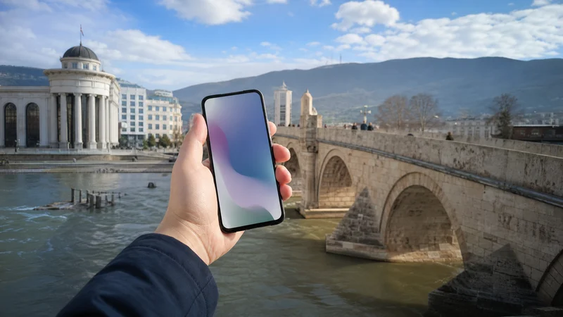 Traveller using a smartphone during north macedonia esim on android in North Macedonia.