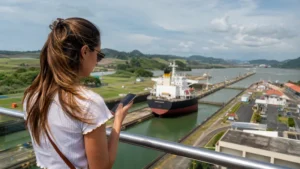 Traveller using a smartphone in Panama for panama canal mobile internet