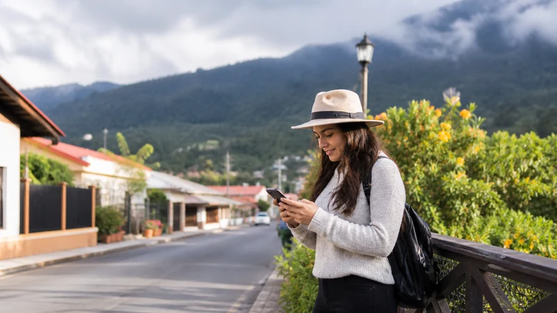 Traveller using a smartphone in Panama for panama city boquete mobile internet