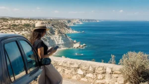 Traveller using a smartphone during paphos to limassol mobile internet guide