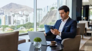 Traveller using a smartphone in Peru for peru business travel internet