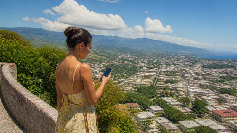Traveller using a smartphone in the Dominican Republic for puerto plata santiago mobile internet