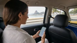 Traveller using a smartphone in Brazil for rio galeao airport to copacabana mobile internet