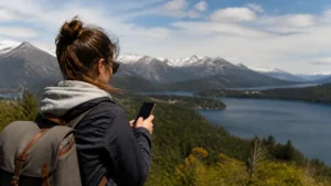 Traveller using a smartphone in Argentina for internet access between salta and jujuy