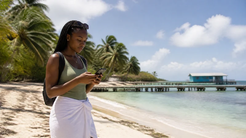 Traveller using a smartphone in Colombia for mobile data on san andrés island