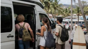 Traveller using a smartphone in El Salvador while researching staying connected between san salvador and el tunco