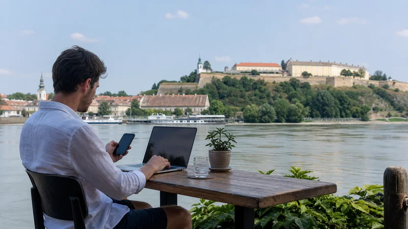 Traveller using a smartphone during serbia internet for digital nomads in Serbia.