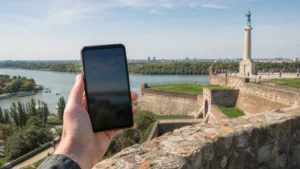 Traveller using a smartphone during serbia esim on android in Serbia.