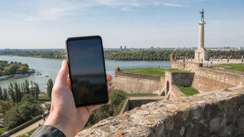 Traveller using a smartphone during serbia esim on android in Serbia.