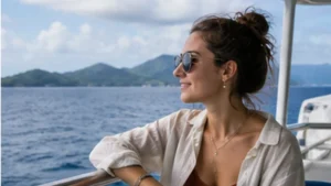 Traveller using a smartphone aboard a ferry in Seychelles