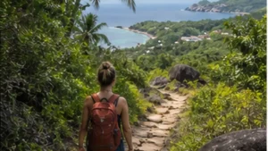 Hiker using a smartphone on a trail in Seychelles