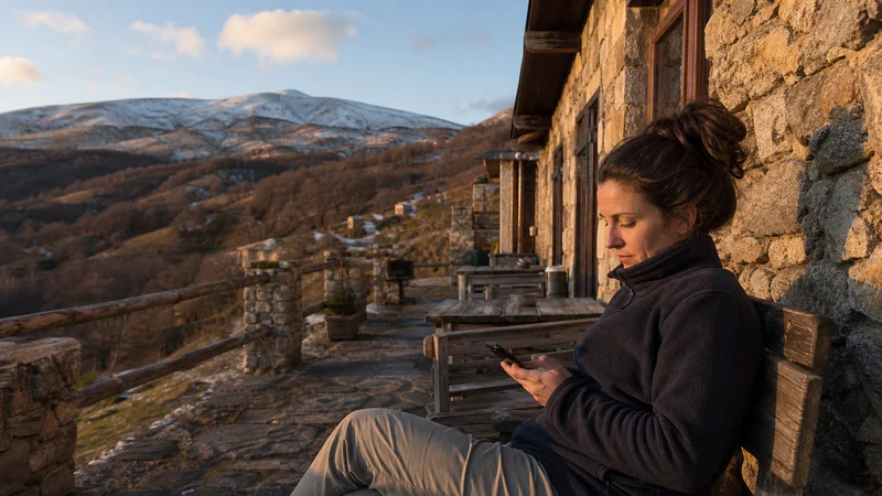 Traveller using a smartphone during slow mobile data in north macedonia in North Macedonia.