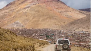 Traveller using a smartphone in Bolivia while researching staying connected between sucre and potosí