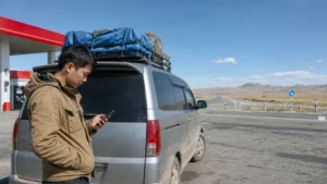 Traveller using a smartphone in Mongolia for ulaanbaatar gobi mobile internet