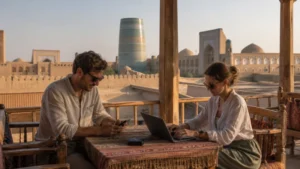 Travellers sharing a mobile hotspot on a terrace in Khiva.