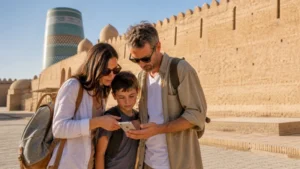 Family travellers checking a phone near Khiva old city