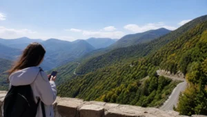 Traveller using a smartphone while using mobile internet between Yerevan and Dilijan